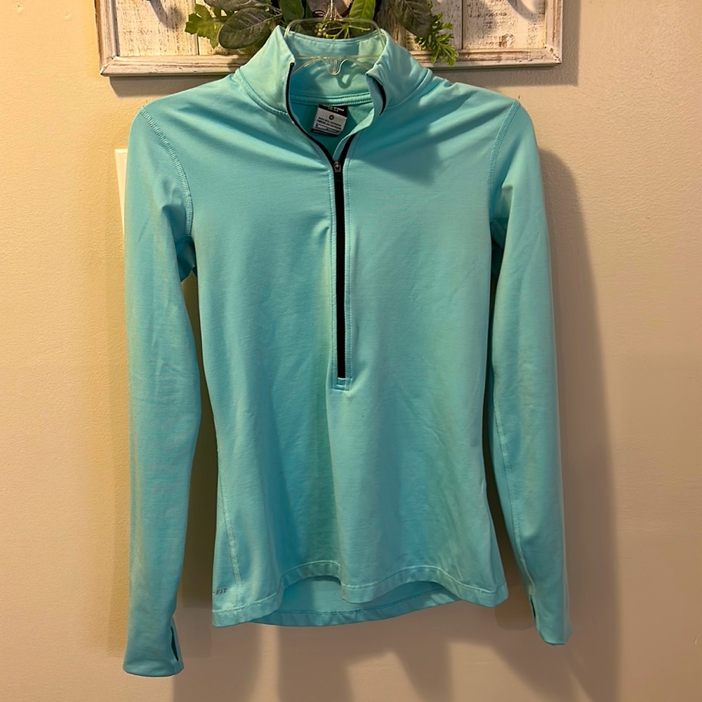 Nike quarter zip with just a bit of a soft warm interior feel!